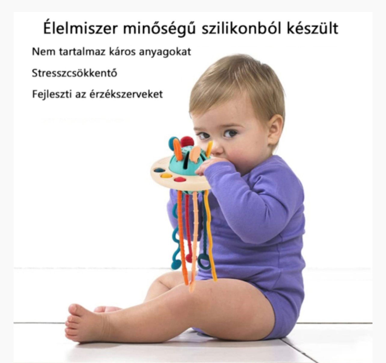 Érzékszervi baba rágóka színes húzós zsinórokkal